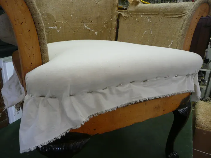 Muslin and cotton, on a 1920s parlor chair in the shop